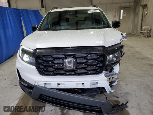 2022 Honda Passport Elite with VIN 5FNYF8H05NB004199, listed as a Copart auction lot 48521594 with 23,913 mi miles. Bid and sale history available at carsss.com. Image 5.