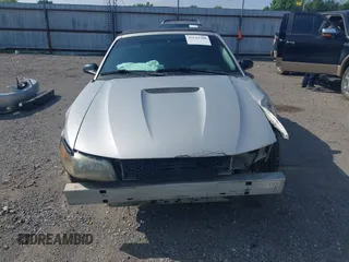 2002 Ford Mustang Deluxe with VIN 1FAFP44432F205991, listed as a IAAI auction lot 42144709 with 138,119 mi miles and . Bid and sale history available at DreamBid. Image 6.