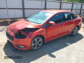 2018 Ford Focus SE z VIN 1FADP3F26JL321831, wystawiony jako IAAI lot #42085951 z przebiegiem 87 729 mil mil oraz . Historia ofert i sprzedaży dostępna na DreamBid. Obrazek 2.