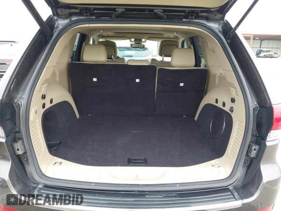2020 Jeep Grand Cherokee Limited with VIN 1C4RJFBG7LC232518, listed as a IAAI auction lot 42502167 with 76,205 mi miles and . Bid and sale history available at DreamBid. Image 17.