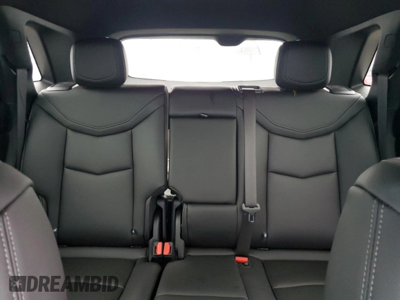 2022 Cadillac XT5 FWD Luxury z VIN 1GYKNAR48NZ163921, wystawiony jako Copart lot #74507874 z przebiegiem 5 723 mil mil oraz Nie do naprawy • Non repairable. Historia ofert i sprzedaży dostępna na DreamBid. Obrazek 10.