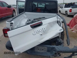 2023 Jeep Gladiator Overland z VIN 1C6HJTFG7PL566484, wystawiony jako IAAI lot #42424428 z przebiegiem 52 057 mil mil oraz . Historia ofert i sprzedaży dostępna na DreamBid. Obrazek 6.