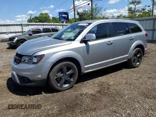 2020 Dodge Journey Crossroad z VIN 3C4PDCGBXLT271084, wystawiony jako Copart lot #55873025 z przebiegiem 82 988 mil mil oraz Szkoda całkowita • Salvage title. Historia ofert i sprzedaży dostępna na DreamBid. Obrazek 1.