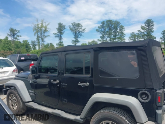 2012 Jeep Wrangler Unlimited Sport with VIN 1C4BJWDG0CL233718, listed as a IAAI auction lot 42551935 with 227,693 mi miles and . Bid and sale history available at DreamBid. Image 14.
