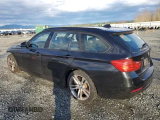 2014 BMW 3 Series 328i xDrive with VIN WBA3G7C54EKN36743, listed as a Copart auction lot 82015554 with 128,503 mi miles and Salvage Title. Bid and sale history available at carsss.com. Image 2.