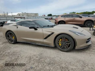 2015 Chevrolet Corvette Z51 1LT z VIN 1G1YH2D74F5117020, wystawiony jako Copart lot #52010015 z przebiegiem Nie podano mil oraz Szkoda całkowita • Salvage title. Historia ofert i sprzedaży dostępna na DreamBid. Obrazek 4.