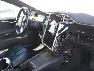 2015 Tesla Model S 85 kWh Battery with VIN 5YJSA1H11FFP75796, listed as a IAAI auction lot 41799524 with 1 mi miles. Bid and sale history available at carsss.com. Image 19.