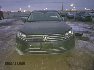 2016 Volkswagen Touareg Sport with VIN WVGEF9BP2GD005296, listed as a Copart auction lot 88808735 with 133,429 mi miles and Salvage Title. Bid and sale history available at DreamBid. Image 5.