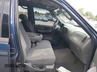 2003 Ford F-150 XLT with VIN 1FTRW08L73KB50541, listed as a IAAI auction lot 42740941 with 181,828 mi miles and . Bid and sale history available at DreamBid. Image 5.
