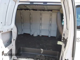 2020 Chevrolet Express Cargo Van with VIN 1GCWGBFP8L1120262, listed as a IAAI auction lot 42010679 with 114,589 mi miles. Bid and sale history available at carsss.com. Image 8.