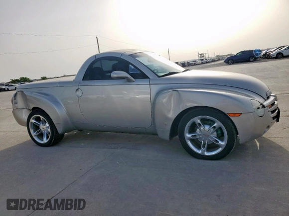 2005 Chevrolet SSR LS z VIN 1GCES14H75B114899, wystawiony jako Copart lot #56712515 z przebiegiem 99 359 mil mil oraz Szkoda całkowita • Salvage title. Historia ofert i sprzedaży dostępna na DreamBid. Obrazek 4.