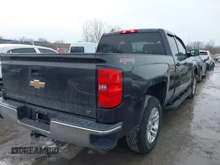 2014 Chevrolet Silverado 1500 LT with VIN 1GCVKREC2EZ149018, listed as a IAAI auction lot 41403200 with 153,760 mi miles and . Bid and sale history available at DreamBid. Image 4.