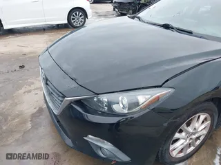 2016 Mazda Mazda3 i Grand Touring with VIN 3MZBM1N75GM267972, listed as a IAAI auction lot 41030060 with 86,065 mi miles. Bid and sale history available at carsss.com. Image 6.