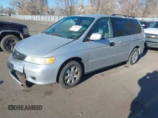 2004 Honda Odyssey EX z VIN 5FNRL186X4B061960, wystawiony jako IAAI lot #41384578 z przebiegiem 262 866 mil mil oraz . Historia ofert i sprzedaży dostępna na DreamBid. Obrazek 2.