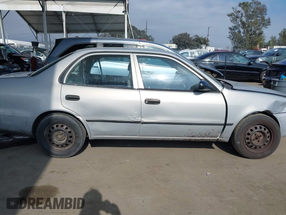 2000 Toyota Corolla VE with VIN 1NXBR12E6YZ393077, listed as a IAAI auction lot 42111914 with 181,056 mi miles and . Bid and sale history available at DreamBid. Image 14.