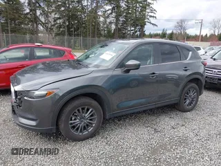 2021 Mazda CX-5 Touring with VIN JM3KFBCM2M0484011, listed as a IAAI auction lot 41825954 with 48,958 mi miles. Bid and sale history available at carsss.com. Image 14.