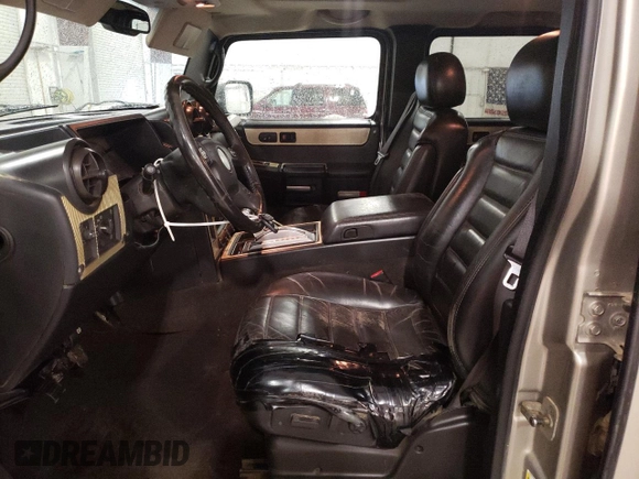 2007 Hummer H2 SUV z VIN 5GRGN23U37H110237, wystawiony jako Copart lot #55328955 z przebiegiem 273 955 mil mil oraz Szkody całkowita. Historia ofert i sprzedaży dostępna na DreamBid. Obrazek 7.