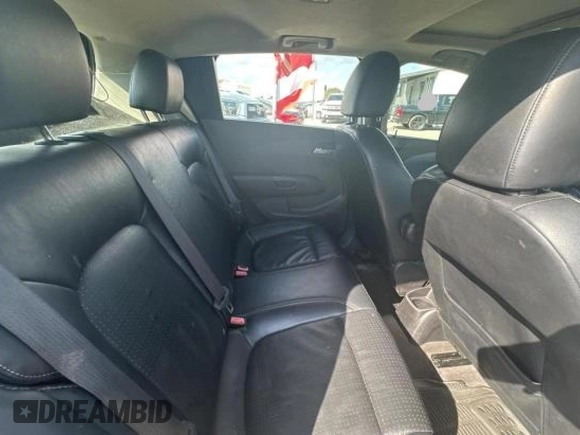 2012 Chevrolet Sonic LTZ z VIN 1G1JE6SH5C4133693, wystawiony jako Copart lot #45226865 z przebiegiem 142 151 mil mil oraz Czysty tytuł • Clean title. Historia ofert i sprzedaży dostępna na DreamBid. Obrazek 6.