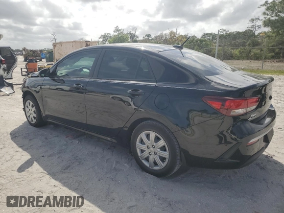 2023 Kia Rio S with VIN 3KPA24AD7PE592716, listed as a Copart auction lot 47929405 with 24,605 mi miles and Non Repairable. Bid and sale history available at carsss.com. Image 2.