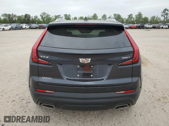 2023 Cadillac XT4 FWD Luxury with VIN 1GYAZAR46PF104791, listed as a Copart auction lot 51351115 with 17,930 mi miles and Salvage Title. Bid and sale history available at DreamBid. Image 6.