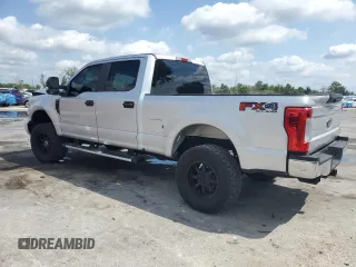 2018 Ford F-250 XL with VIN 1FT7W2B66JEB16396, listed as a Copart auction lot 55442695 with 165,538 mi miles and Salvage title. Bid and sale history available at DreamBid. Image 2.