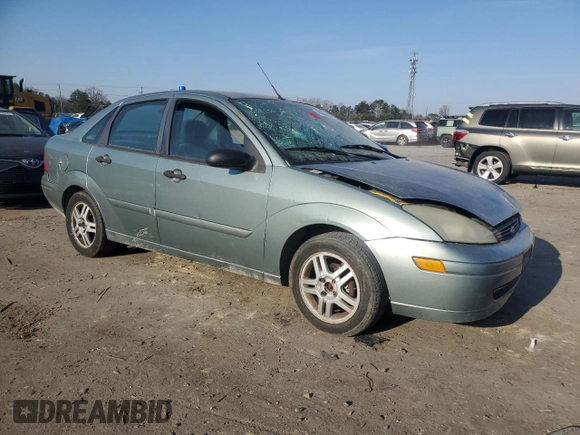 2004 Ford Focus SE with VIN 1FAFP34314W127053, listed as a Copart auction lot 48652265 with 241,841 mi miles and Salvage title. Bid and sale history available at DreamBid. Image 4.