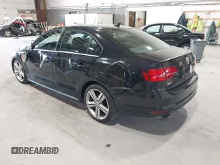 2015 Volkswagen Jetta Sedan 2.0T GLI SE with VIN 3VW5T7AJ0FM275867, listed as a IAAI auction lot 42133491 with 98,718 mi miles. Bid and sale history available at carsss.com. Image 3.