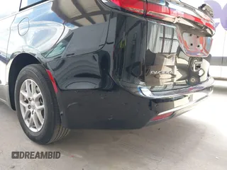 2023 Chrysler Pacifica Touring L with VIN 2C4RC1BG1PR550628, listed as a IAAI auction lot 42553430 with 61,773 mi miles and . Bid and sale history available at DreamBid. Image 22.