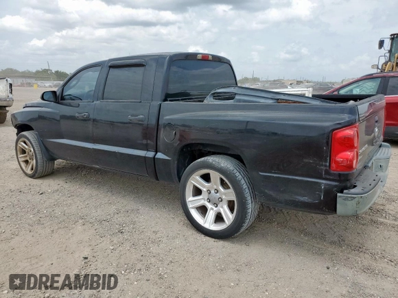2005 Dodge Dakota ST z VIN 1D7HE28K35S235225, wystawiony jako Copart lot #57684725 z przebiegiem 184 546 mil mil oraz Szkoda całkowita • Salvage title. Historia ofert i sprzedaży dostępna na DreamBid. Obrazek 2.