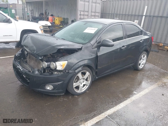 2015 Chevrolet Sonic LTZ with VIN 1G1JE5SB9F4125297, listed as a IAAI auction lot 41920118 with 99,928 mi miles. Bid and sale history available at carsss.com. Image 18.