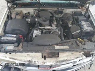 1997 GMC Suburban with VIN 1GKEC16R9VJ728883, listed as a Copart auction lot 52104265 with 246,816 mi miles and Salvage Title. Bid and sale history available at carsss.com. Image 12.