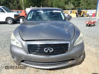 2011 Infiniti M with VIN JN1BY1APXBM325191, listed as a Copart auction lot 74209614 with 136,662 mi miles and Salvage Title. Bid and sale history available at DreamBid. Image 5.