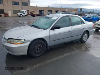 1999 Honda Accord LX z VIN 1HGCG5645XA023392, wystawiony jako IAAI lot #41525751 z przebiegiem 214 850 mil mil oraz . Historia ofert i sprzedaży dostępna na DreamBid. Obrazek 2.