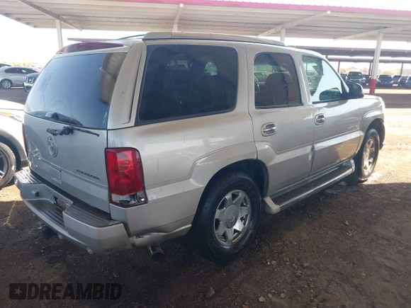 2005 Cadillac Escalade z VIN 1GYEC63T65R164307, wystawiony jako IAAI lot #42015617 z przebiegiem 173 270 mil mil oraz . Historia ofert i sprzedaży dostępna na DreamBid. Obrazek 4.