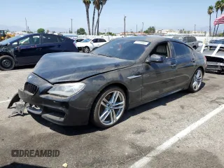 2014 BMW 6 Series 650i with VIN WBA6B2C5XED128959, listed as a Copart auction lot 61125664 with Not Provided miles and Salvage Title. Bid and sale history available at carsss.com. Image 1.