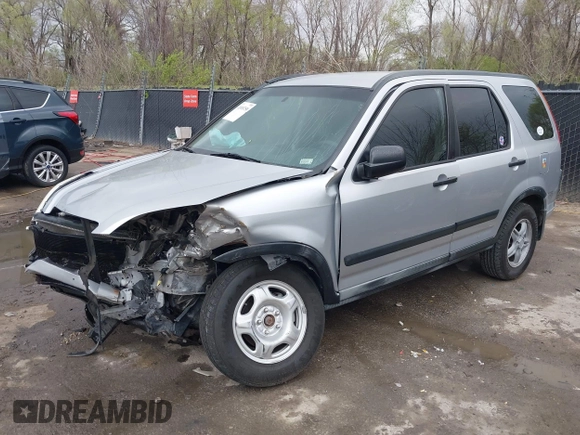 2002 Honda CR-V LX z VIN JHLRD78402C077631, wystawiony jako IAAI lot #41918750 z przebiegiem 186 827 mil mil oraz . Historia ofert i sprzedaży dostępna na DreamBid. Obrazek 17.