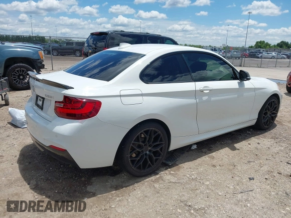 2014 BMW 2 Series 228i with VIN WBA1F5C54EV256303, listed as a IAAI auction lot 42214512 with 81,116 mi miles and . Bid and sale history available at DreamBid. Image 4.