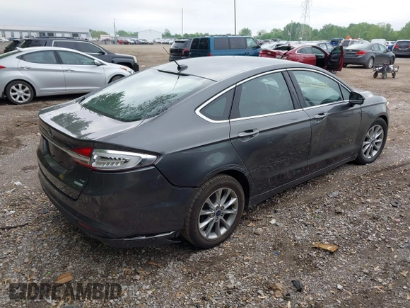 2017 Ford Fusion SE with VIN 3FA6P0HD3HR335350, listed as a IAAI auction lot 42201095 with 165,101 mi miles and . Bid and sale history available at DreamBid. Image 4.