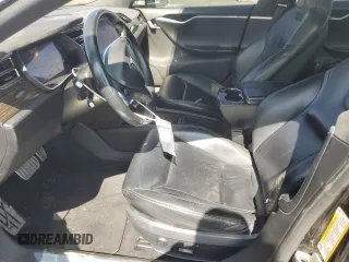 2014 Tesla Model S P85D with VIN 5YJSA1H28EFP63765, listed as a Copart auction lot 50241385 with 100,274 mi miles and Salvage Title. Bid and sale history available at DreamBid. Image 7.