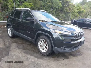 2015 Jeep Cherokee Latitude z VIN 1C4PJMCB4FW648897, wystawiony jako IAAI lot #42182493 z przebiegiem 129 457 mil mil oraz . Historia ofert i sprzedaży dostępna na DreamBid. Obrazek 1.