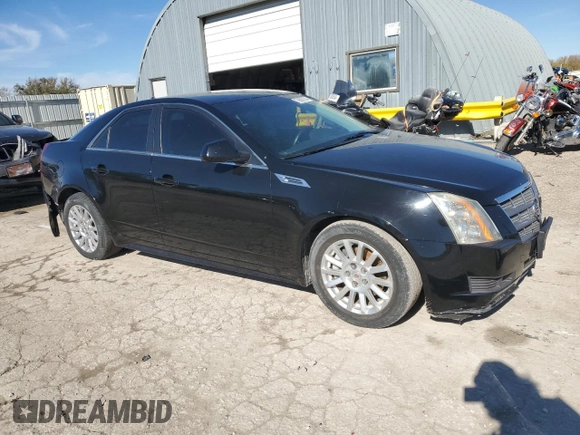 2010 Cadillac CTS with VIN 1G6DA5EG1A0133596, listed as a Copart auction lot 79690124 with 145,379 mi miles and Salvage Title. Bid and sale history available at DreamBid. Image 4.