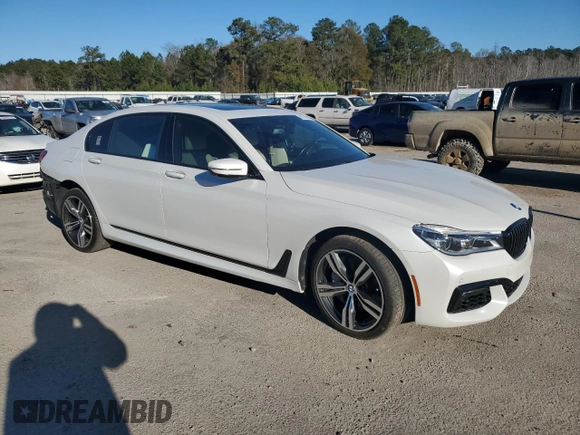 2019 BMW 7 Series 750i with VIN WBA7F0C5XKGM25897, listed as a Copart auction lot 86758004 with 68,700 mi miles and Salvage title. Bid and sale history available at DreamBid. Image 4.