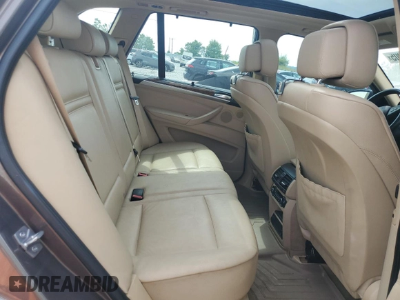 2012 BMW X5 35i with VIN 5UXZV4C51CL748765, listed as a Copart auction lot 62339905 with Not provided miles and Clean title. Bid and sale history available at DreamBid. Image 11.