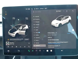 2022 Tesla Model Y Long Range z VIN 7SAYGDEE2NF420882, wystawiony jako IAAI lot #42023642 z przebiegiem 19 783 mil mil oraz . Historia ofert i sprzedaży dostępna na DreamBid. Obrazek 15.