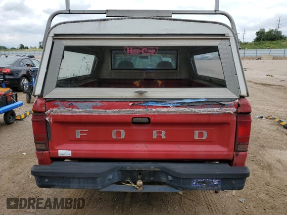 1992 Ford Ranger z VIN 1FTCR14U3NPA43414, wystawiony jako Copart lot #62961125 z przebiegiem 50 828 mil mil oraz Czysty tytuł • Clean title. Historia ofert i sprzedaży dostępna na DreamBid. Obrazek 6.