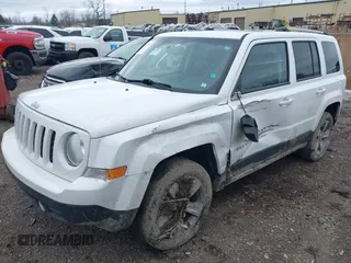 2016 Jeep Patriot High Altitude Edition with VIN 1C4NJRFB9GD808902, listed as a IAAI auction lot 41919059 with 123,265 mi miles. Bid and sale history available at carsss.com. Image 2.