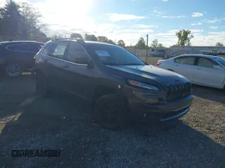 2015 Jeep Cherokee Limited with VIN 1C4PJMDS4FW659798, listed as a IAAI auction lot 40482812 with 65,453 mi miles. Bid and sale history available at carsss.com. Image 1.