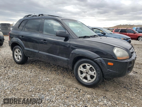 2009 Hyundai Tucson SE with VIN KM8JN72D49U975875, listed as a Copart auction lot 76923954 with 167,155 mi miles and Salvage Title. Bid and sale history available at carsss.com. Image 4.