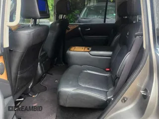 2012 Infiniti QX56 7-passenger with VIN JN8AZ2NE7C9015769, listed as a Copart auction lot 61275105 with 164,342 mi miles and Clean title. Bid and sale history available at DreamBid. Image 6.