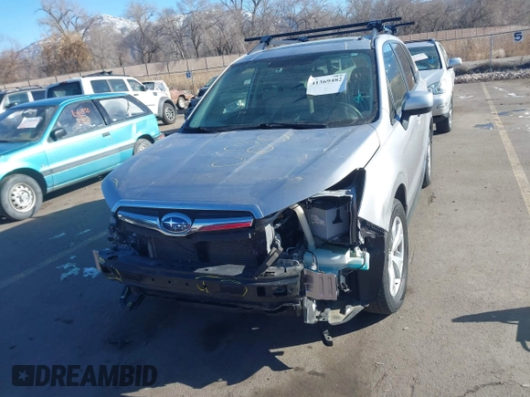 2014 Subaru Forester Premium with VIN JF2SJAEC4EH555249, listed as a IAAI auction lot 41369482 with 175,734 mi miles and . Bid and sale history available at DreamBid. Image 11.